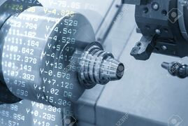 89885265-la-escena-abstracta-de-la-máquina-de-torno-cnc-con-el-fondo-de-datos-nc-la-máquina-de-torneado-que-c.jpg