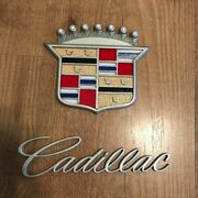 Cadillac emblem and text.jpg
