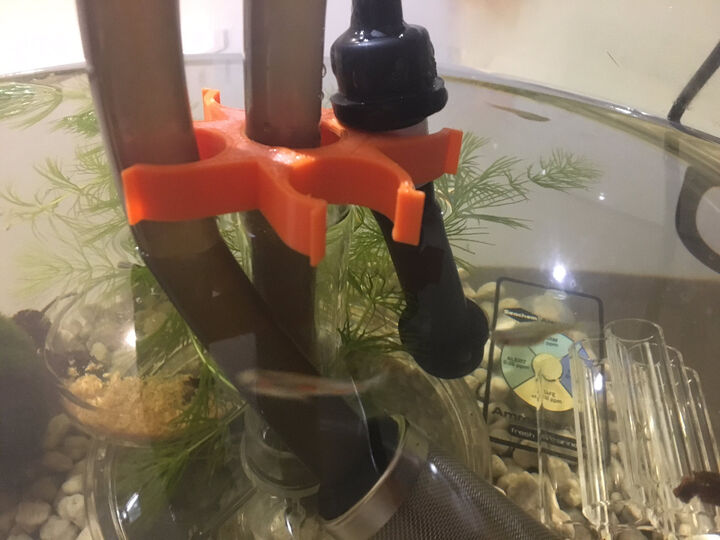 Heater holder for BiOrb round fish aquarium