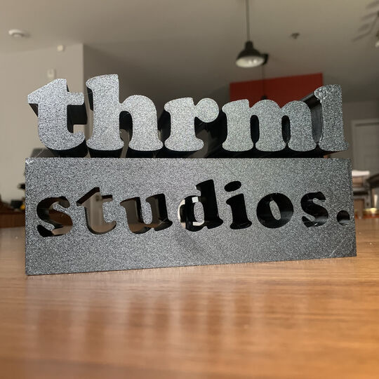 THRMLStudios logo