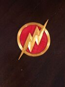flash badge golden.jpg